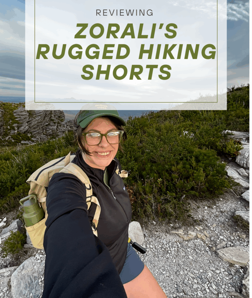 Pinterest graphic for a Zorali Women’s Rugged Hiking Shorts review featuring a midsize hiker smiling on a rocky trail, wearing the shorts with a backpack and cap, overlaid with the blog title “Reviewing Zorali’s Rugged Hiking Shorts” and website URL ifyouseek-amy.com